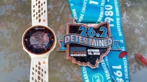 Columbus Marathon finisher's medal and Garmin 620 Watch -- Achieving Millennial