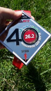 2016 glass city marathon finisher's medal -- achieving millennial